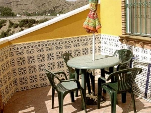 Terraza con muebles