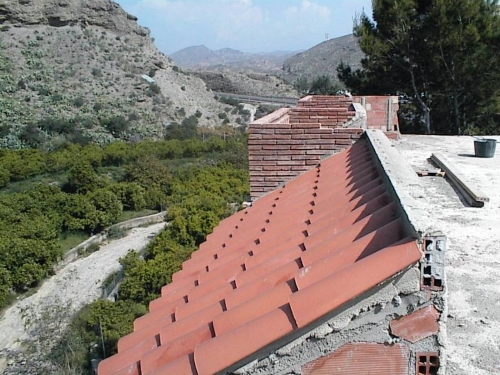 Working on the roof (April 1, 2002)