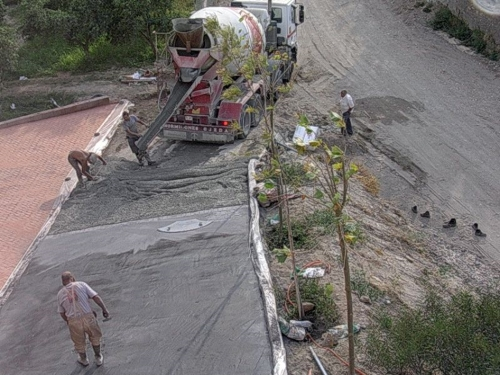 The driveway is being asphalted (October 16, 2005)